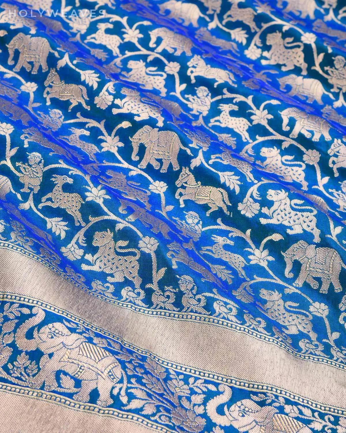 Shot Blue-Green Banarasi Shikargah Cutwork Brocade Handwoven Katan Silk Saree with Elephant Trail Border