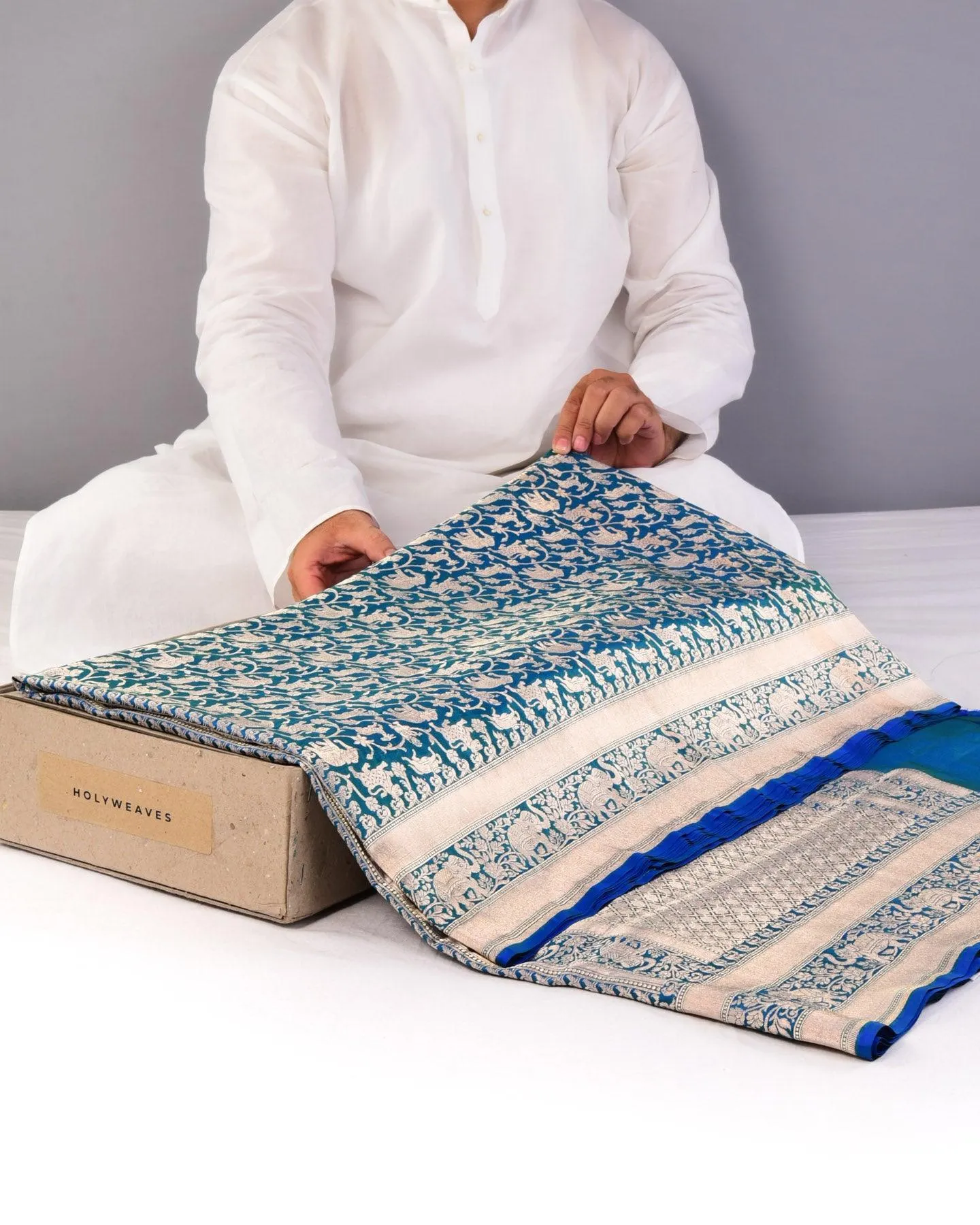 Shot Blue-Green Banarasi Shikargah Cutwork Brocade Handwoven Katan Silk Saree with Elephant Trail Border